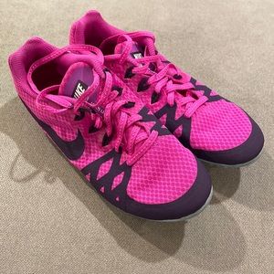 Women’s Nike running track shoes.
